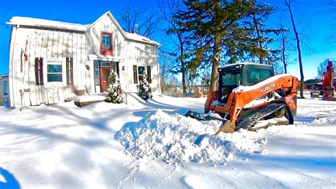 kubota skid steer snow removal|SNOW Plowing OVER 12”! RUBBER TRACK Kubota SVL 75 .